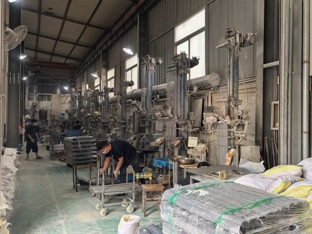 Electrically insulated magnesium oxide powder filling and compacting station